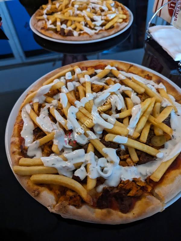 Dinos Pizzaria